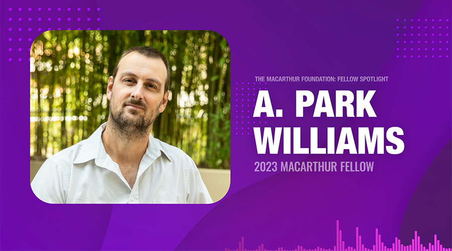 A man in a white shirt stands outdoors; text reads 